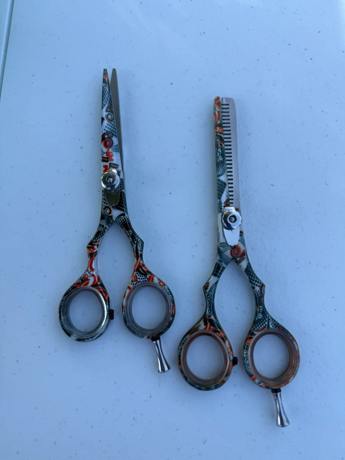 Patterned professional cutting shears with textured ergonomic grip and high-carbon blade