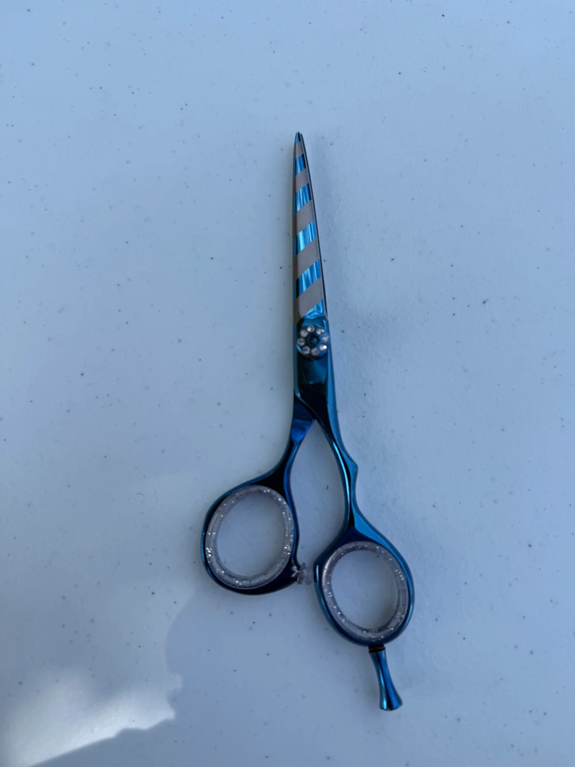 Blue professional hair scissors with precision convex edge